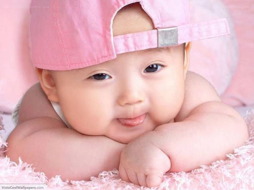 Baby in pink cap