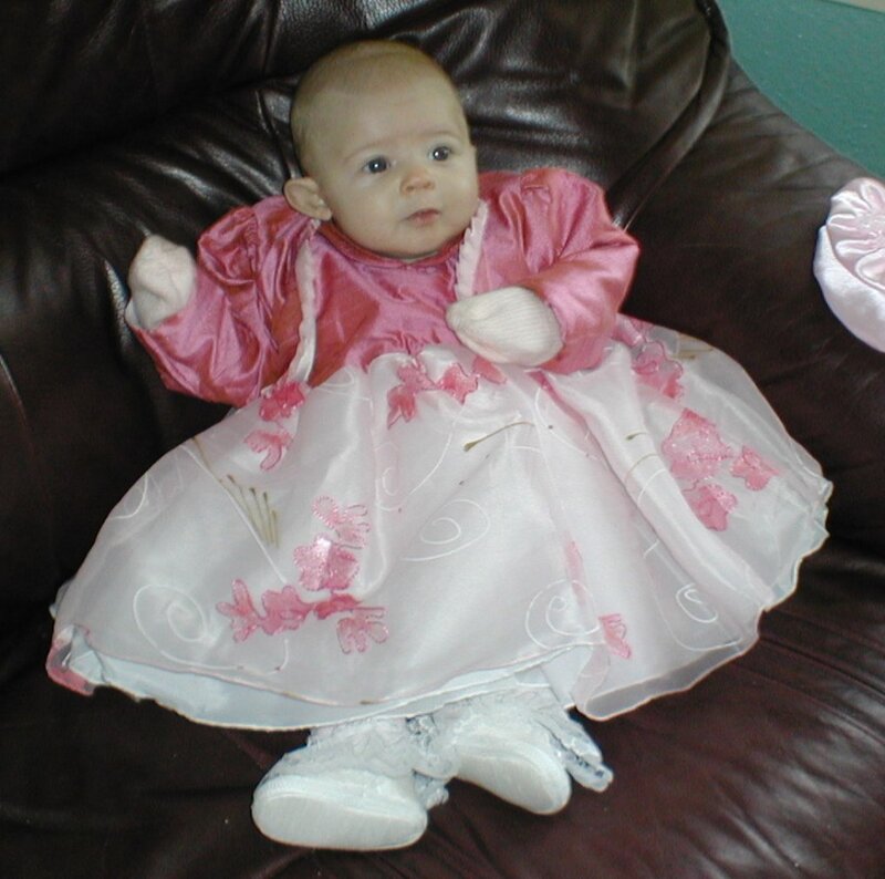 Baby in pink dress