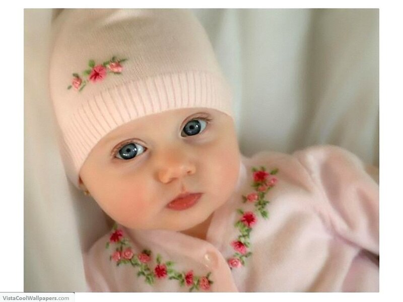 Baby in pink floral outfit
