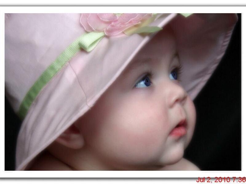 Baby in pink hat