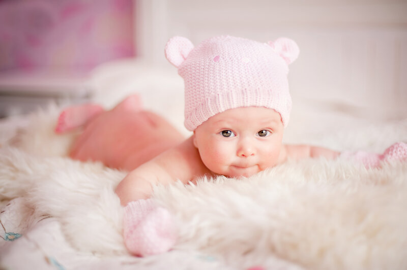 Baby in Pink Hat — Calm, Photograph