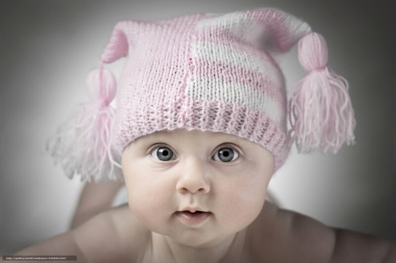 Baby in pink knitted hat
