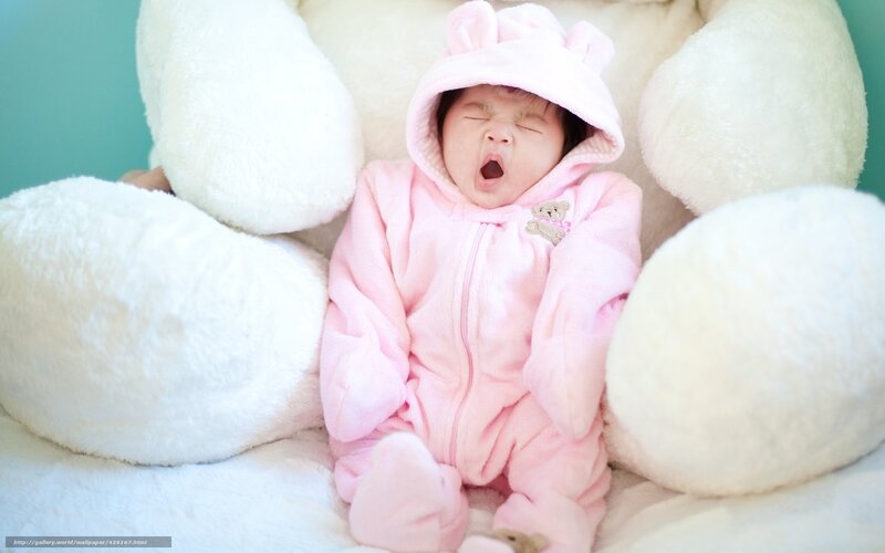 Baby in Pink Onesie — Sleepy