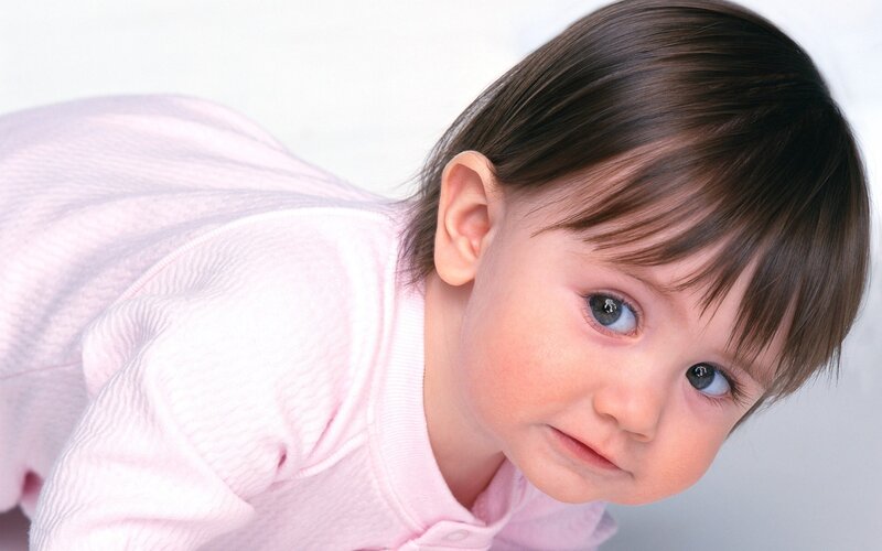 baby in pink onesie
