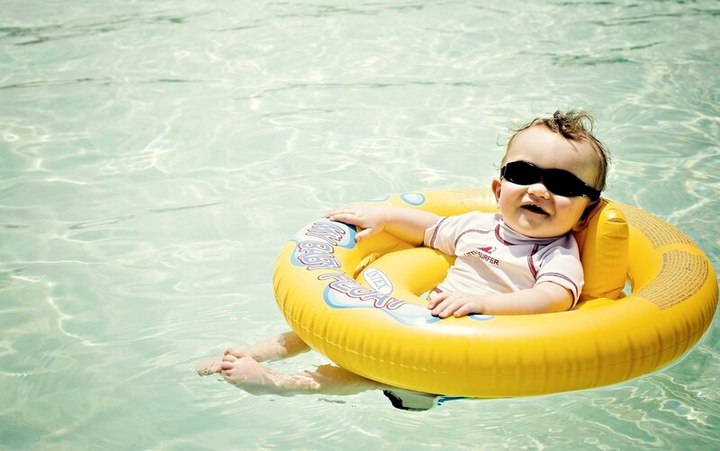 Baby in pool float