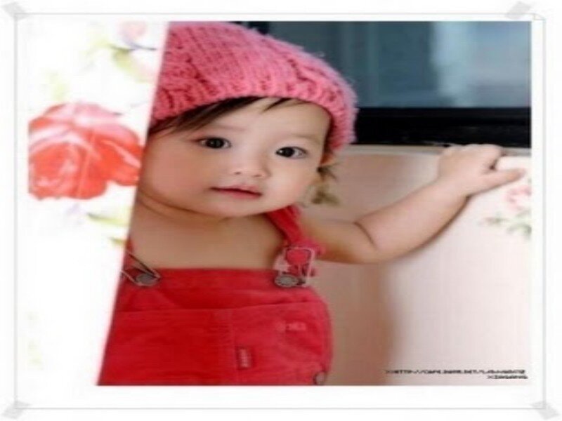 Baby in Red Overalls