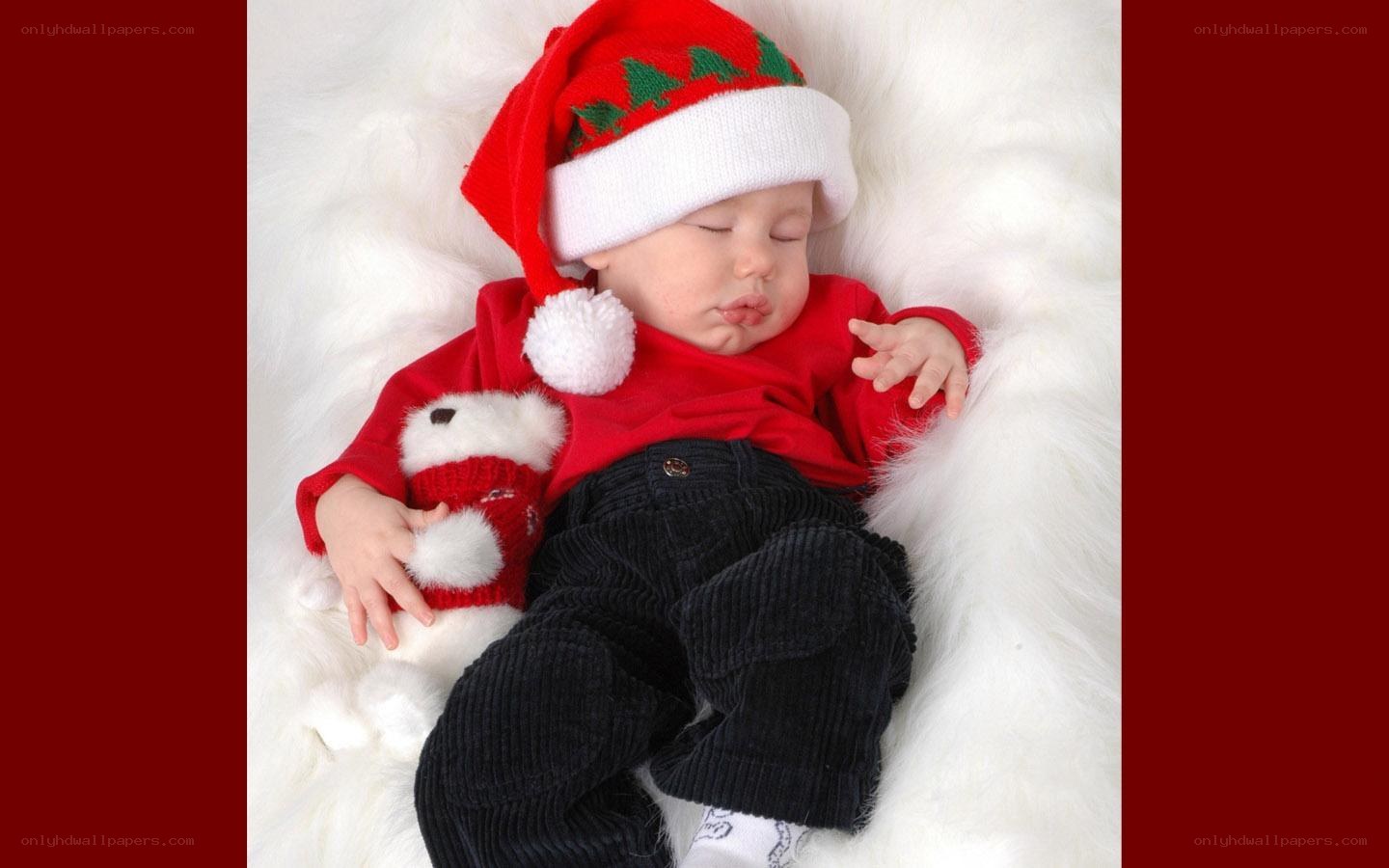 Baby in Santa hat sleeping