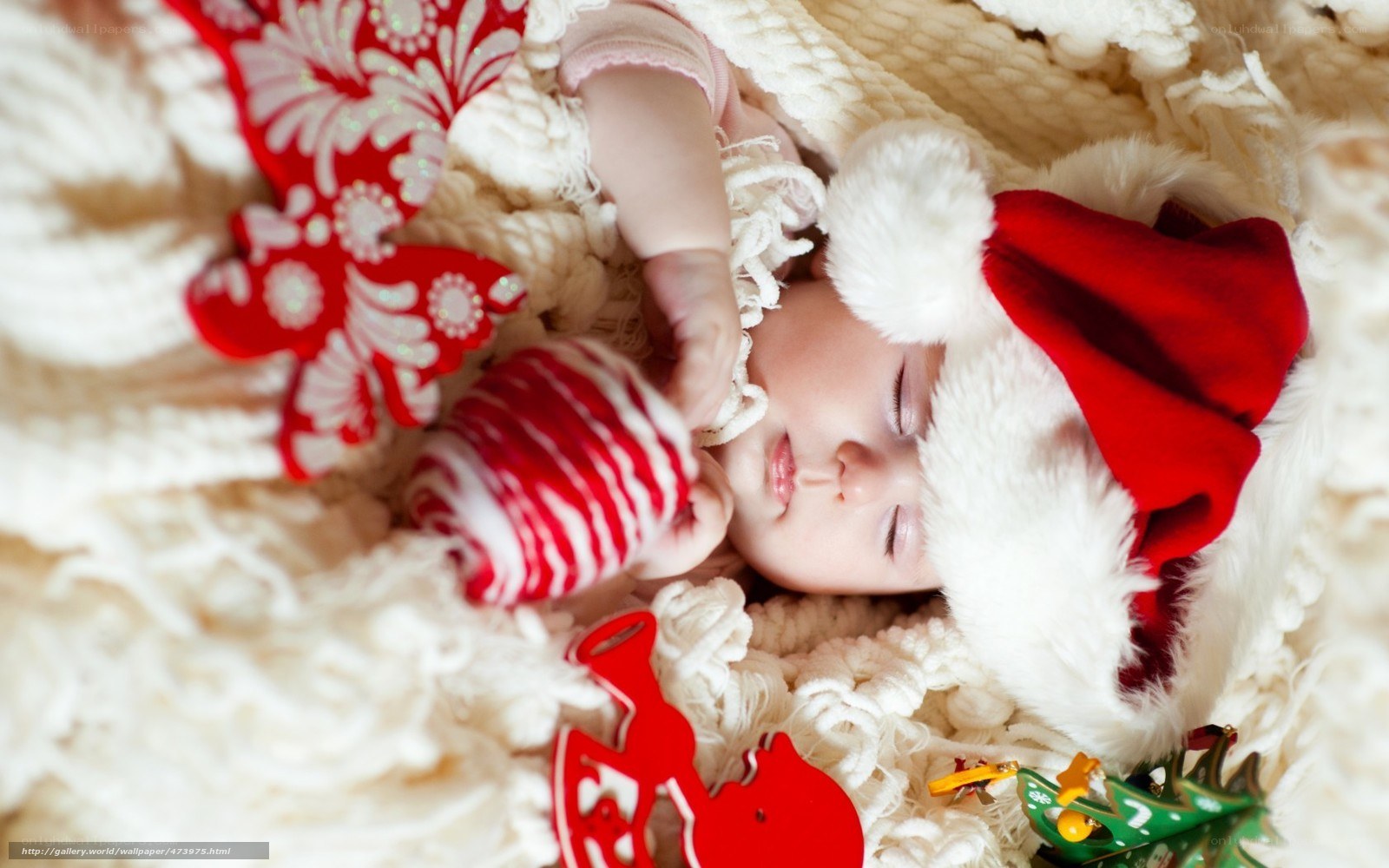 Baby in Santa hat sleeping