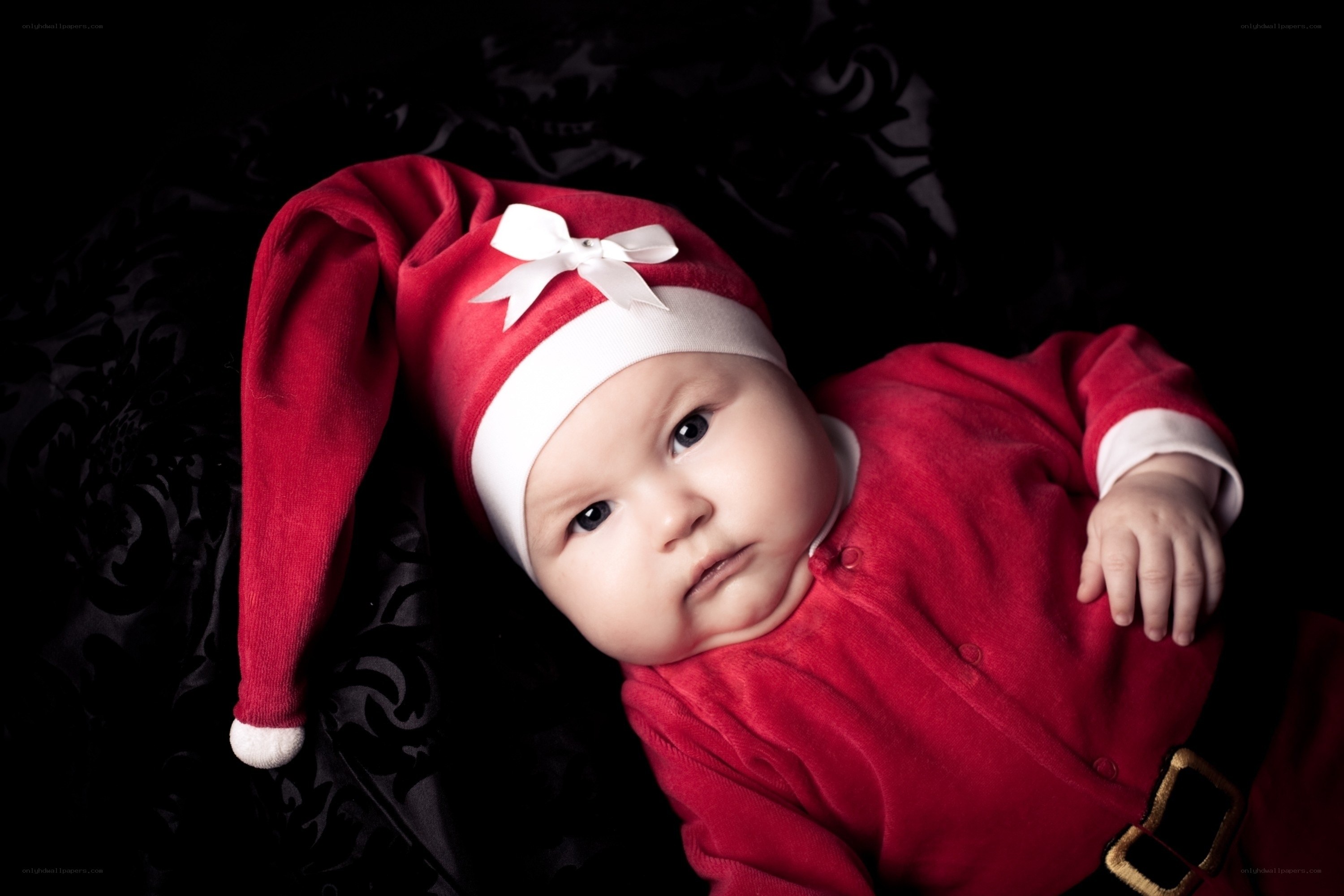 Baby in Santa outfit