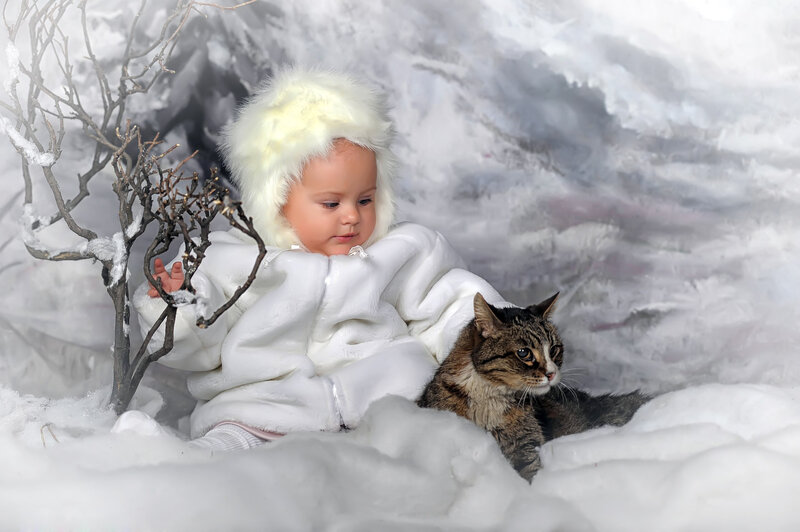 Baby in Snow with Cat