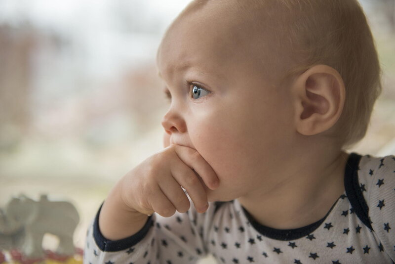 Baby in Star-patterned Onesie