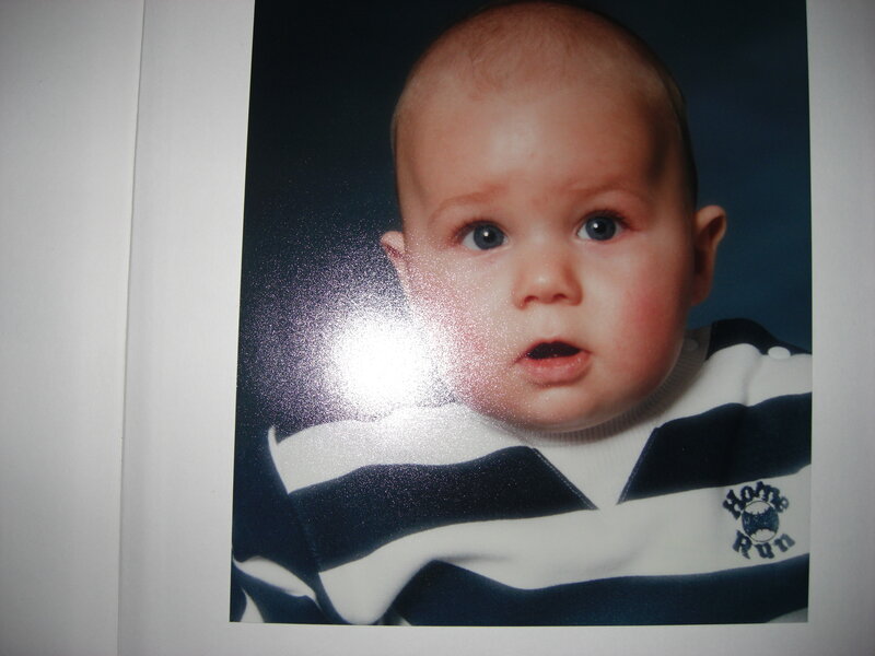 baby in striped sweater