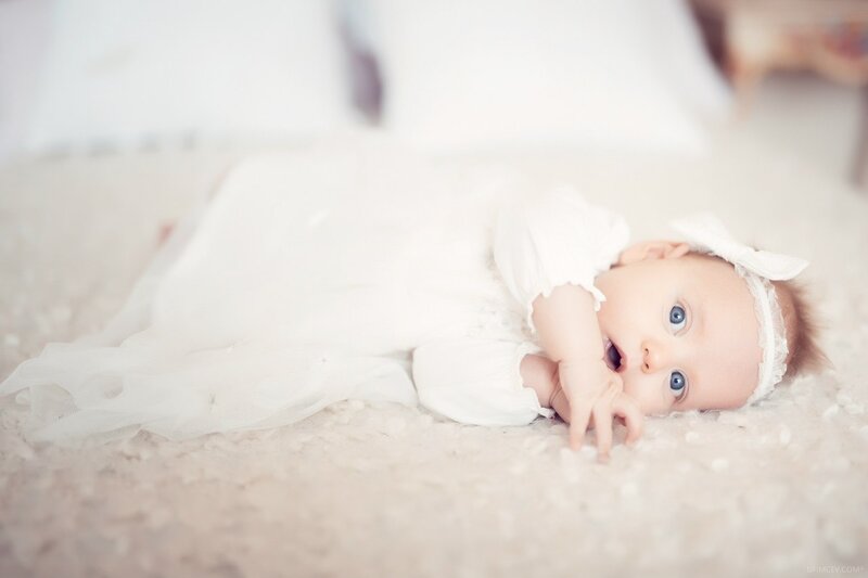 Baby in White Dress — Calm