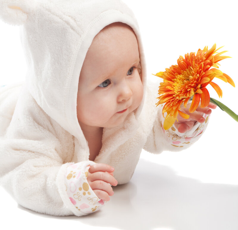 Baby in White Hooded Outfit