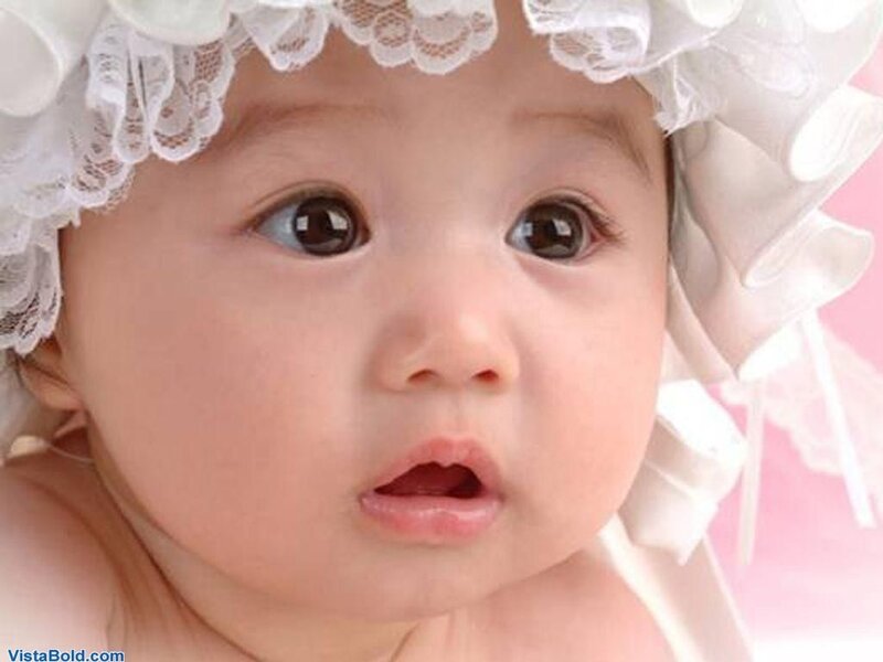 baby in white lace hat