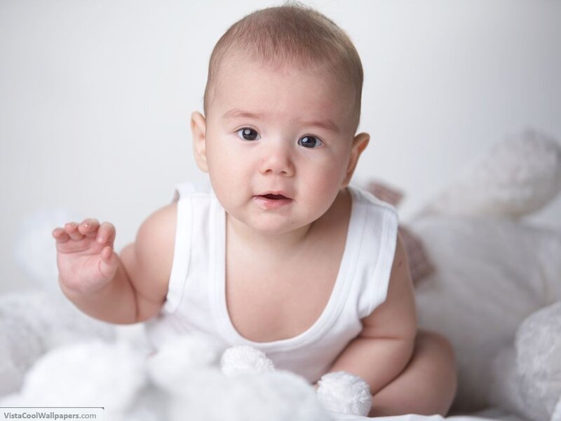 Baby in white onesie