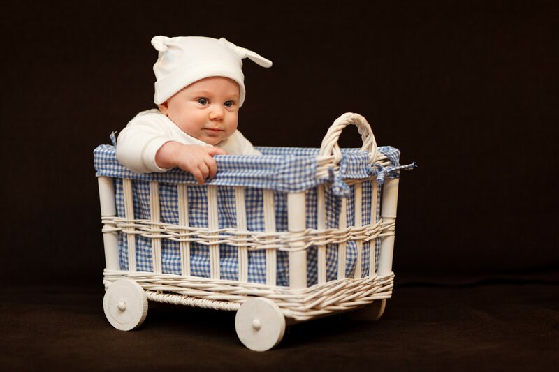 Baby in Wicker Cart — White