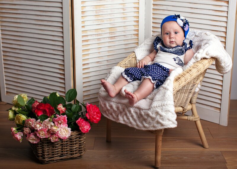 Baby in Wicker Chair — White