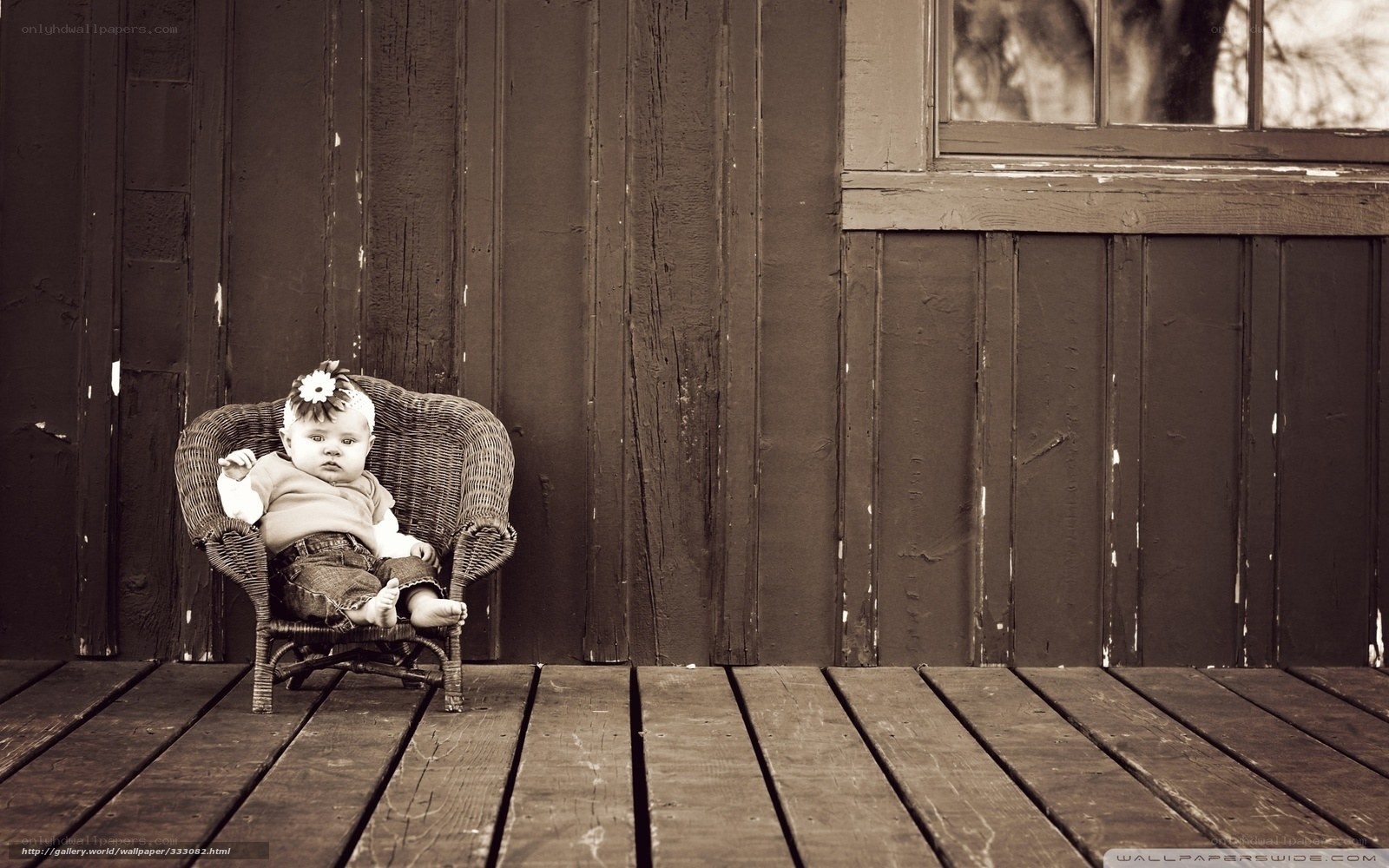 Baby in wicker chair
