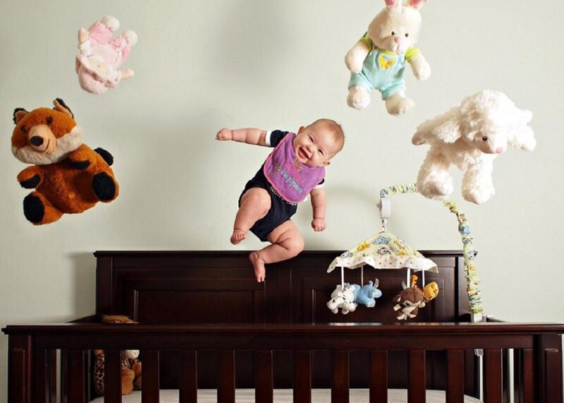 Baby Jumping on Crib — Brown