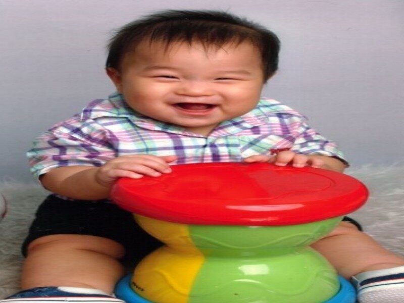 Baby Laughing with Toy