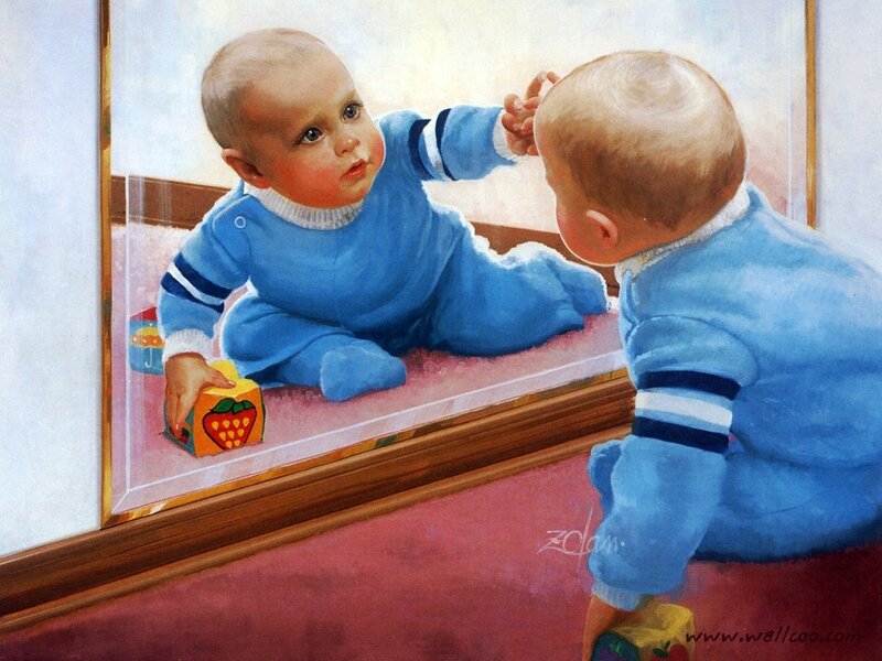 Baby looking in mirror