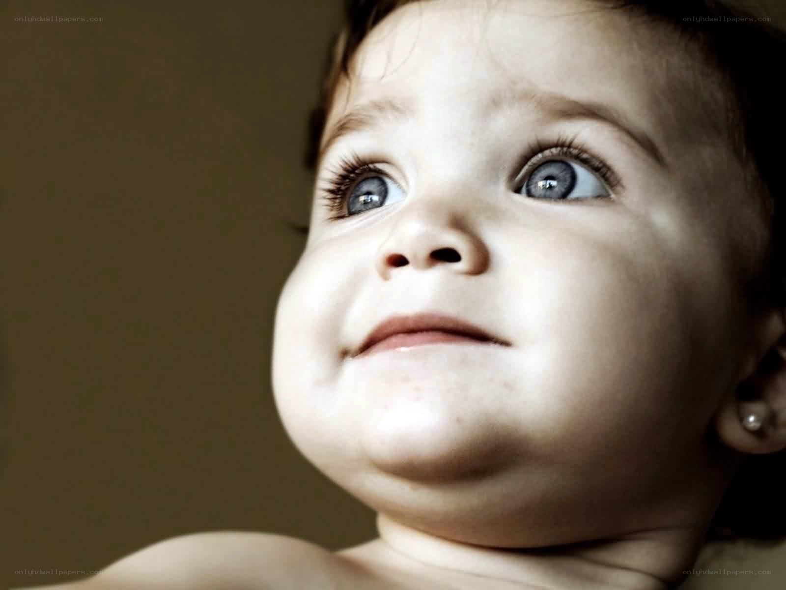 baby looking up with wonder