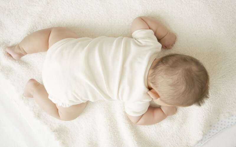 baby lying on back