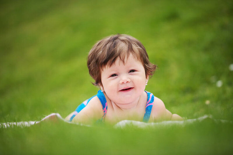 Baby Lying on Grass