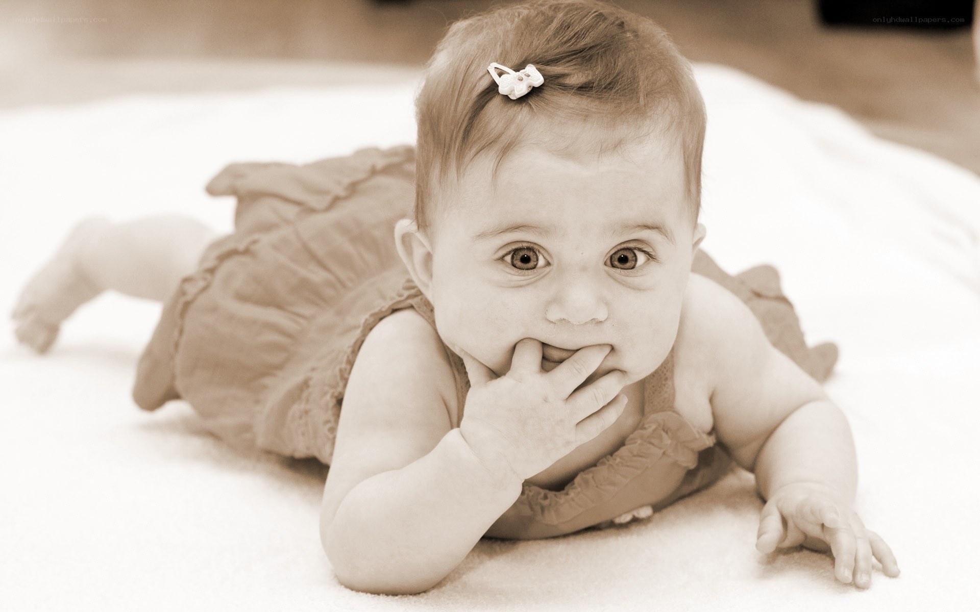 baby lying on stomach