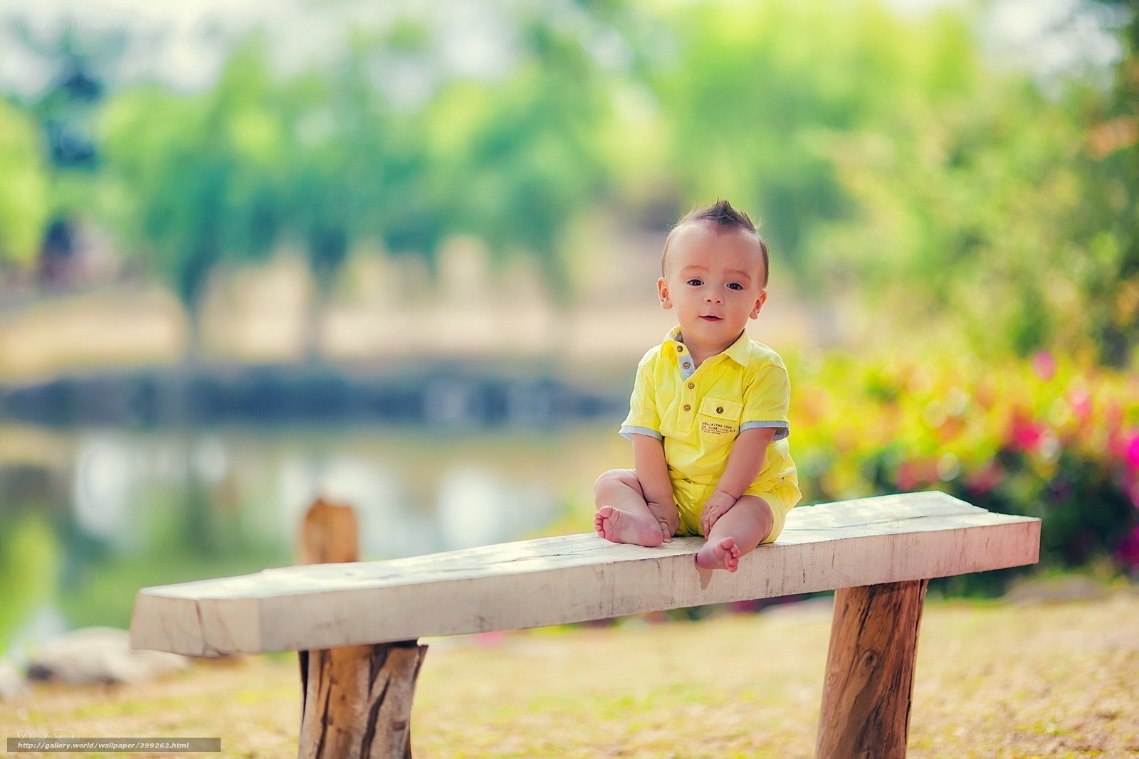 Baby on a wooden bench