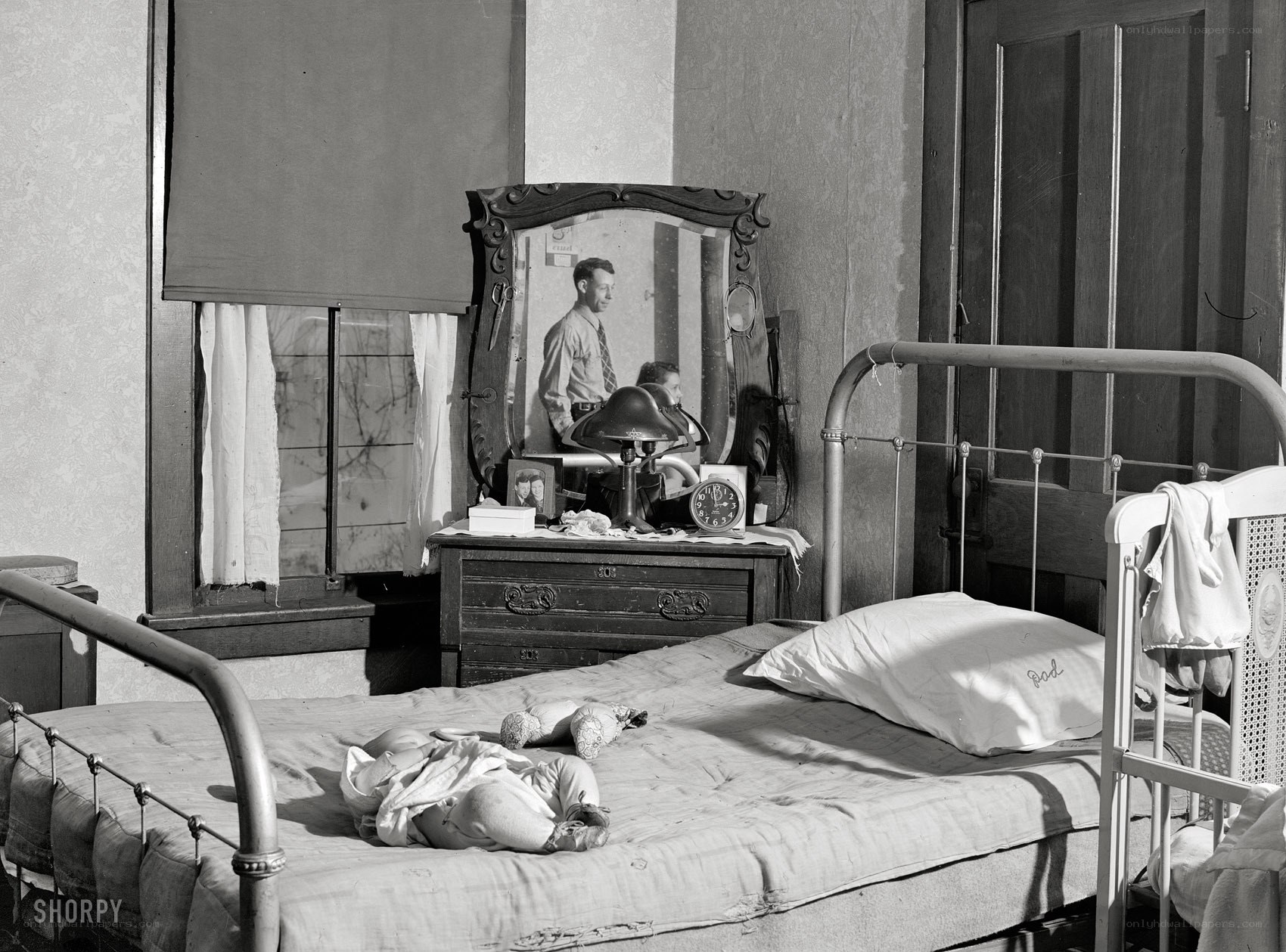 Baby on bed in bedroom