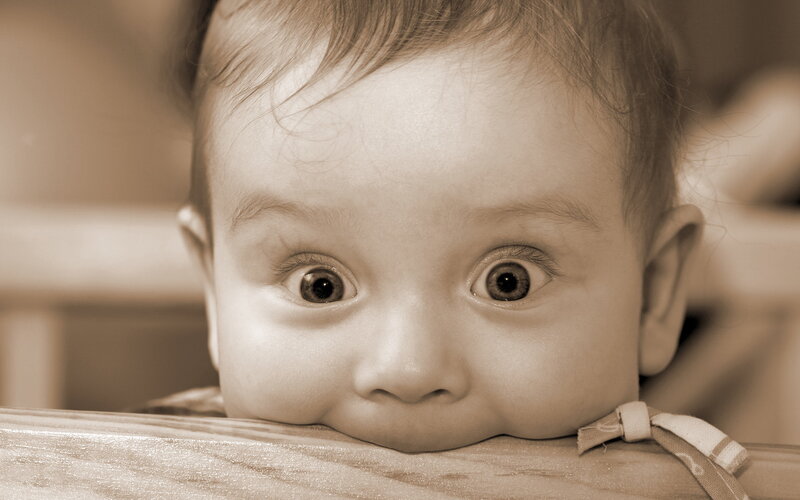 Baby Peeking over Edge — Sepia