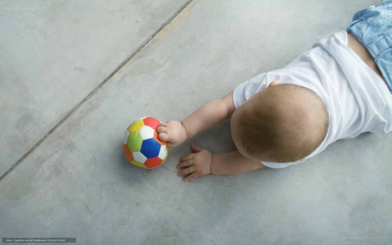Baby playing with a ball