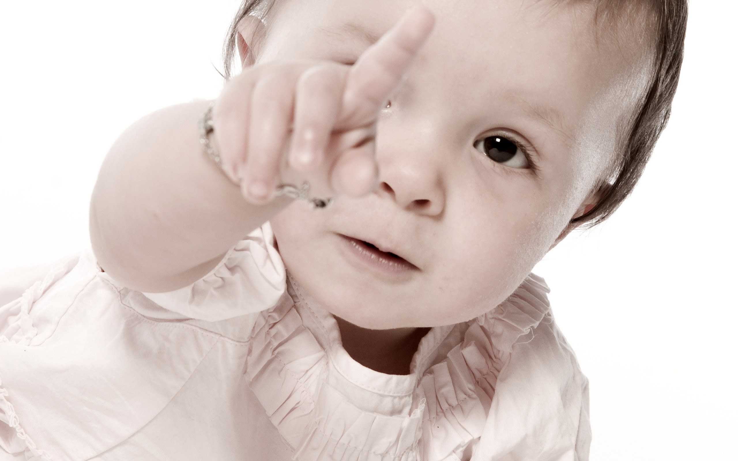baby pointing at camera