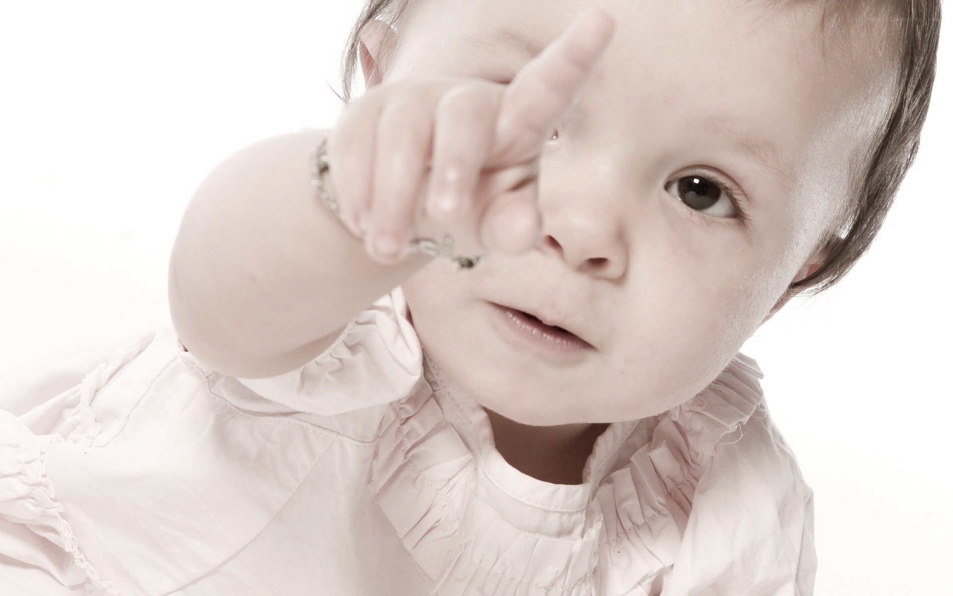 baby pointing at camera