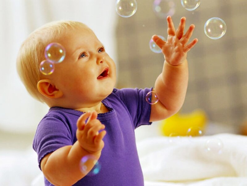 Baby Reaching for Bubbles — Purple
