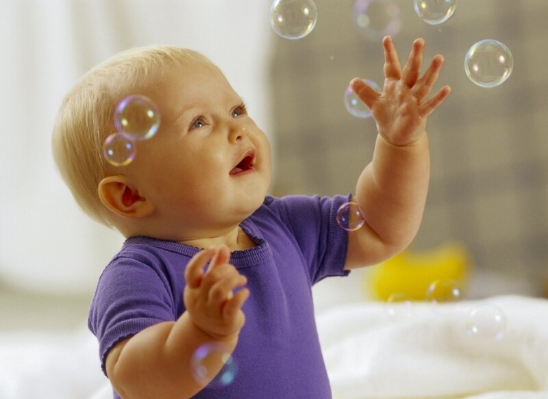 Baby Reaching for Bubbles
