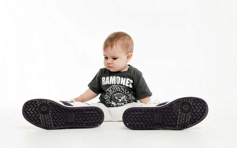 Baby Sitting on Floor — White