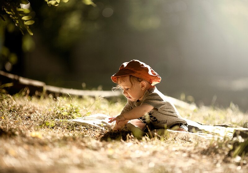Baby Sitting on Grass — Brown