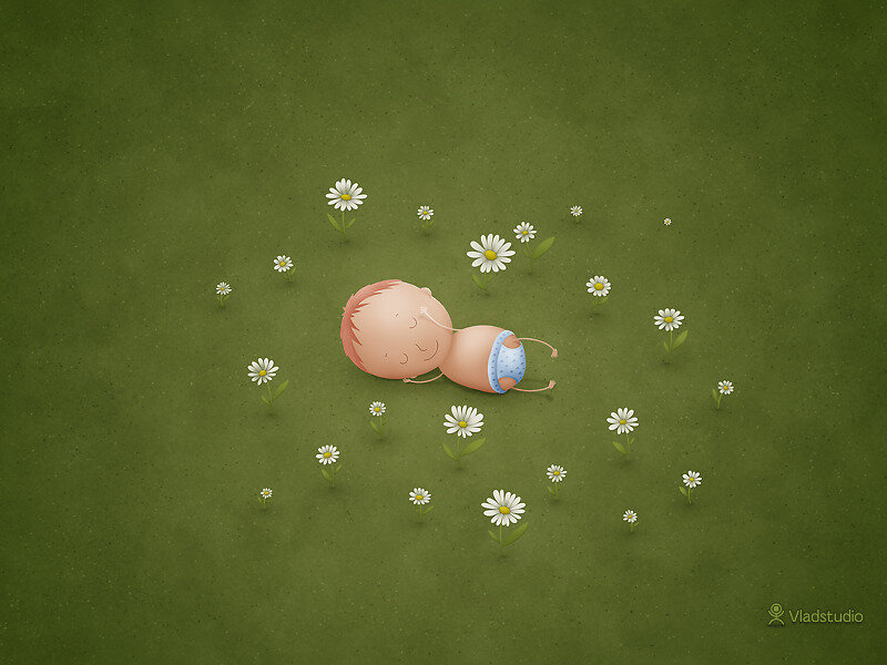 Baby sleeping in a field