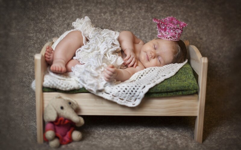 Baby Sleeping in Bed — Brown, Serene