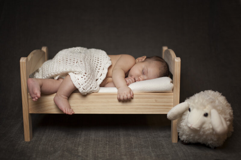 Baby Sleeping in Bed — Brown