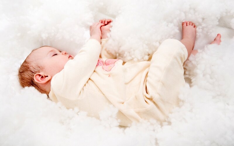 Baby Sleeping in Cotton — White, Serene