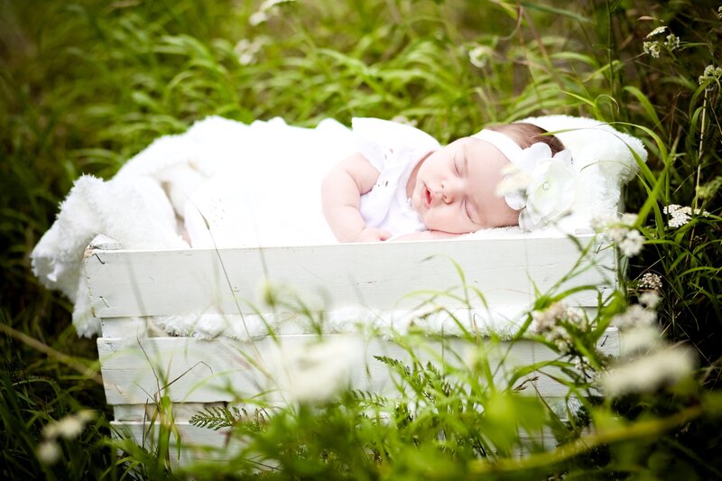 Baby Sleeping in Crate