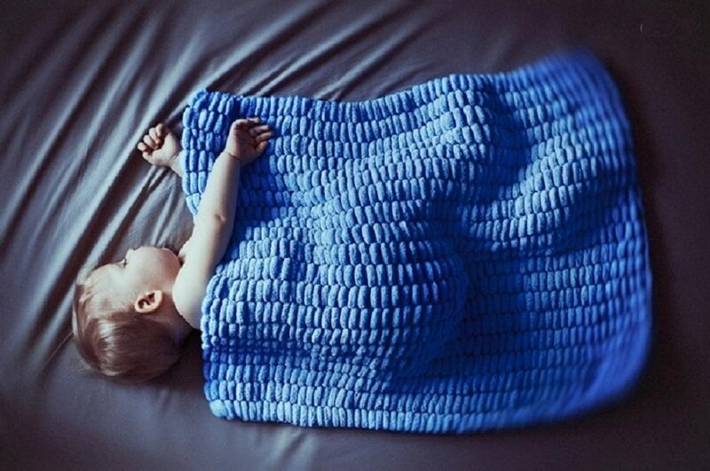 Baby Sleeping on Bed