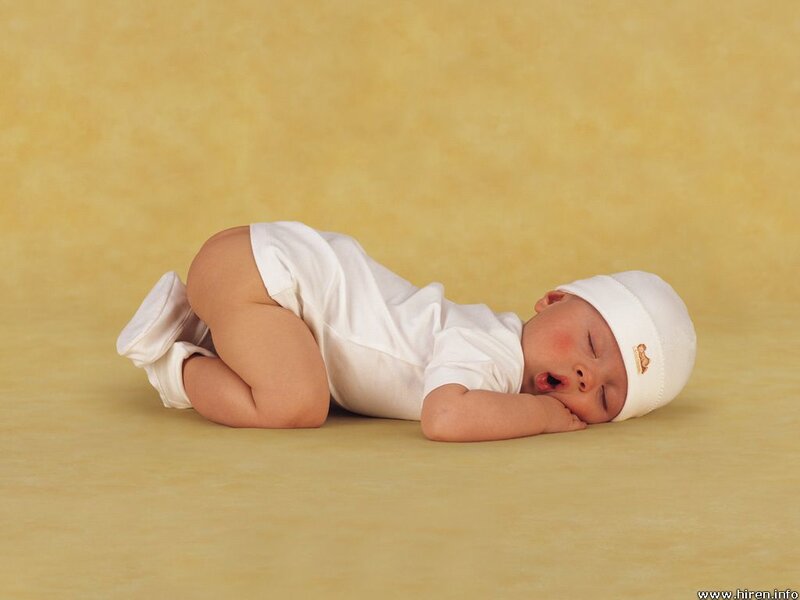 Baby sleeping on floor