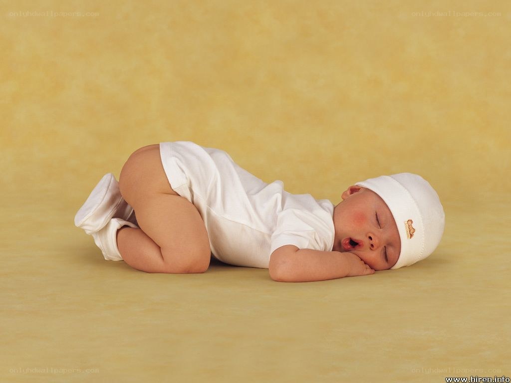 Baby sleeping on floor