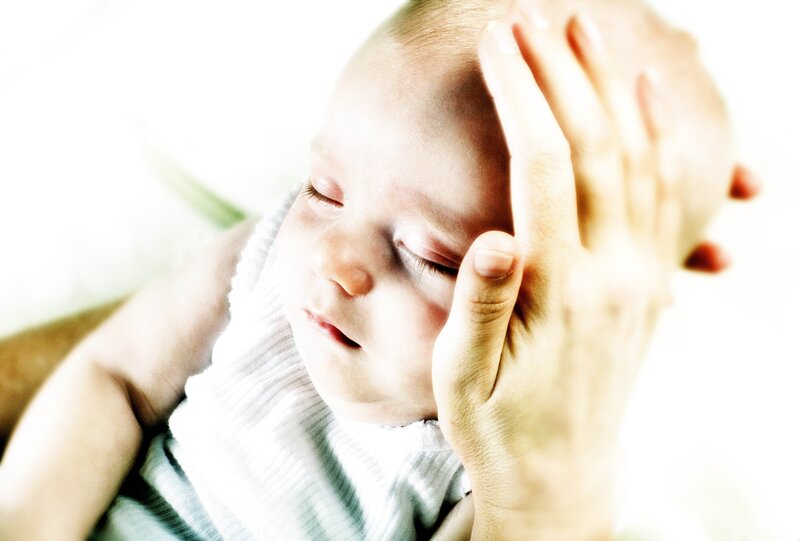 Baby Sleeping on Hand — White