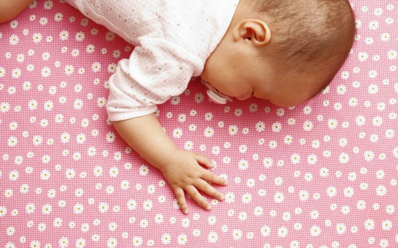 Baby Sleeping on Mat